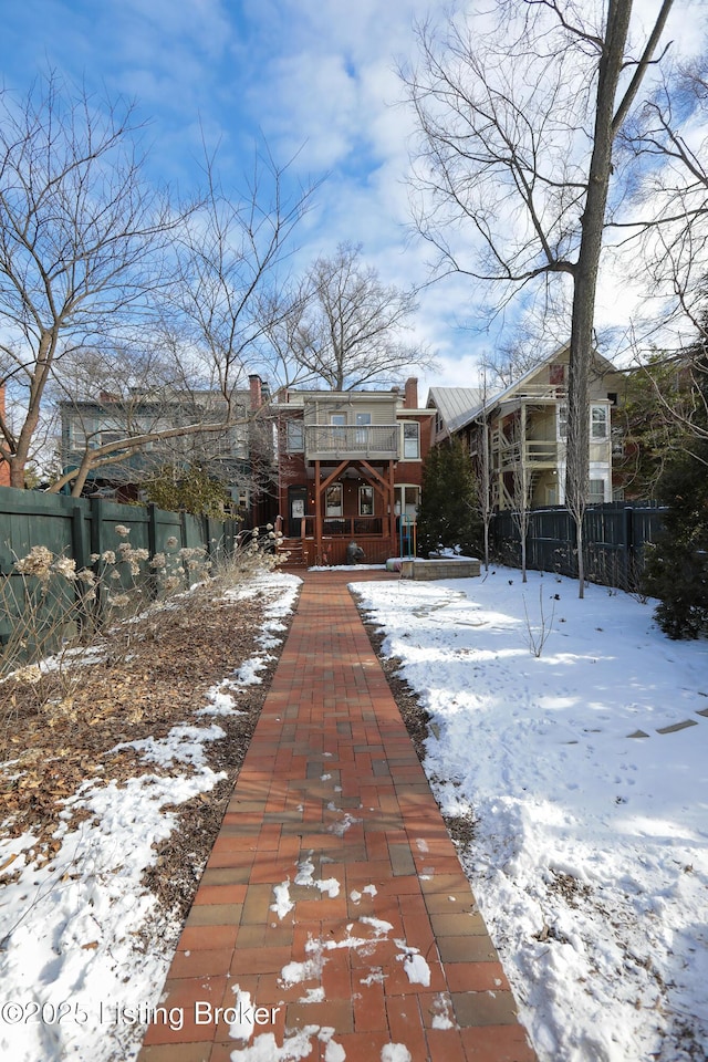 view of front of house with fence