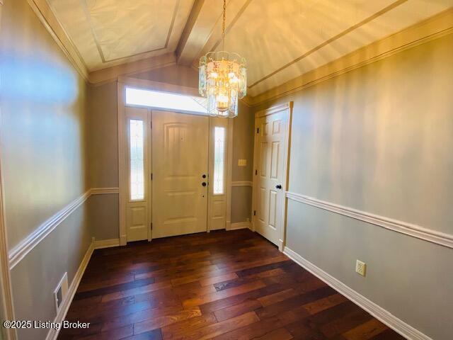 entryway with vaulted ceiling with beams, a notable chandelier, visible vents, baseboards, and dark wood finished floors