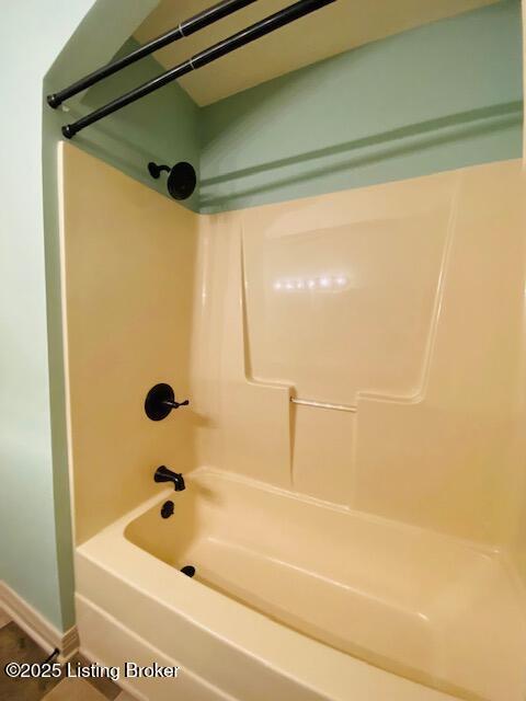 bathroom featuring shower / washtub combination