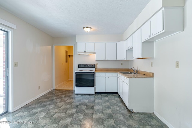 kitchen featuring light countertops, electric range, white cabinetry, a sink, and under cabinet range hood