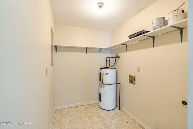 washroom with laundry area, electric water heater, hookup for a washing machine, a textured ceiling, and electric dryer hookup