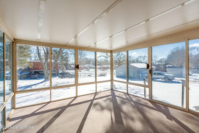 unfurnished sunroom featuring a healthy amount of sunlight