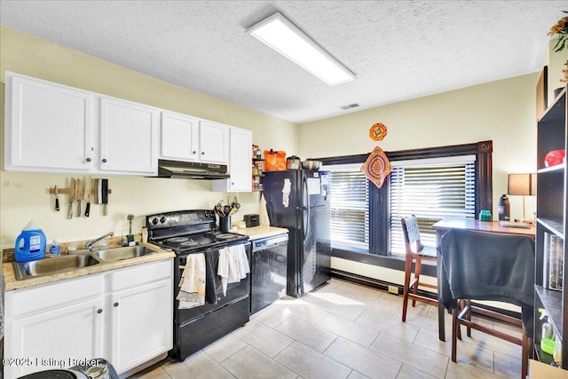 kitchen featuring under cabinet range hood, a sink, white cabinetry, light countertops, and black appliances