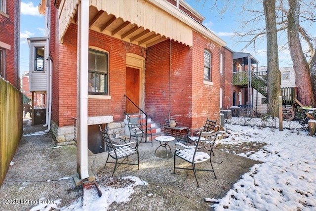 view of snow covered patio