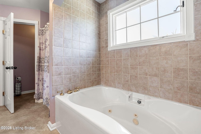 bathroom featuring a whirlpool tub