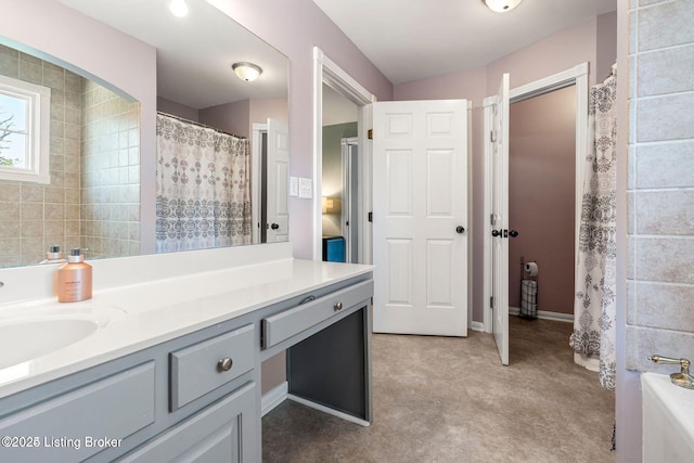 full bathroom with a shower with shower curtain and vanity