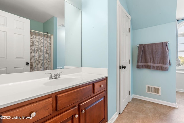 bathroom featuring a shower with curtain, visible vents, vanity, and baseboards