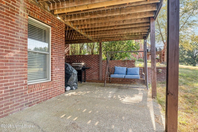 view of patio / terrace with fence and area for grilling