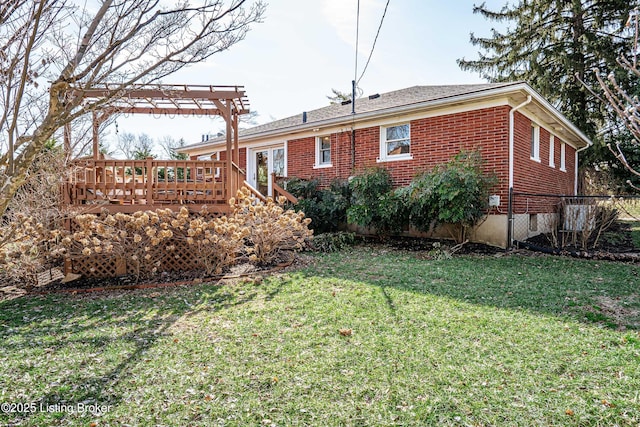 view of yard featuring a pergola and a wooden deck