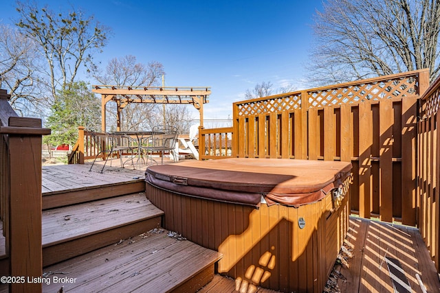 wooden deck featuring outdoor dining space, a covered hot tub, and a pergola