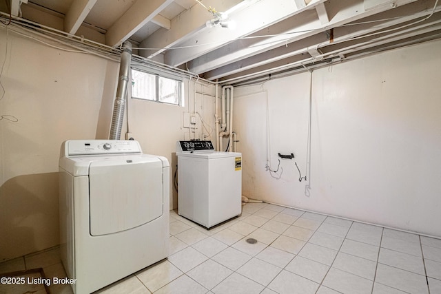 laundry area featuring laundry area and separate washer and dryer