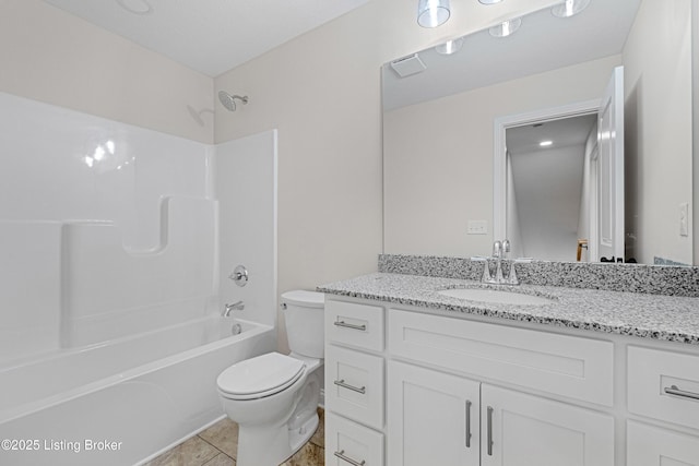 full bath featuring tile patterned flooring, tub / shower combination, vanity, and toilet