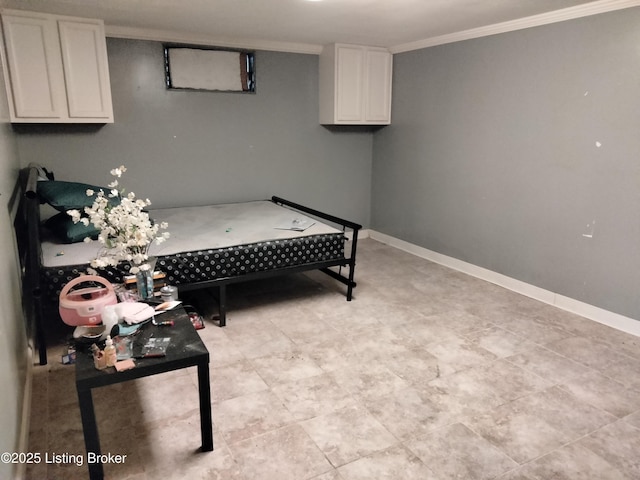 bedroom with baseboards and crown molding