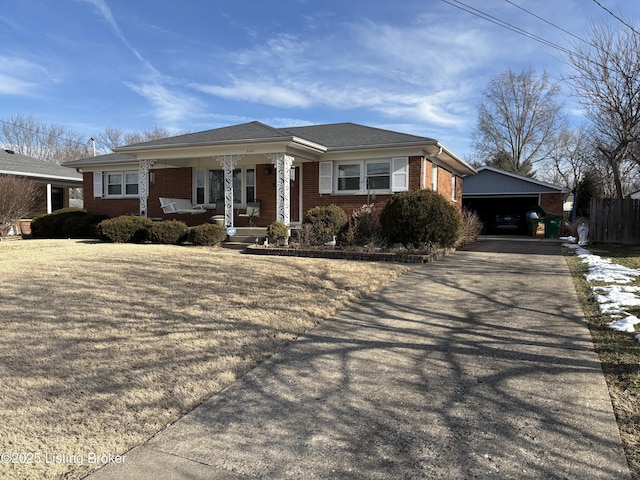 ranch-style home with brick siding and a porch