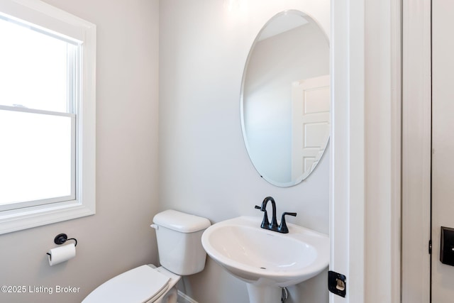 bathroom with a sink and toilet