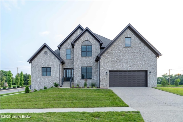 1431 Swan Creek Pl, Louisville, KY 40299 - french country home with a garage, a front lawn, concrete driveway, and brick siding