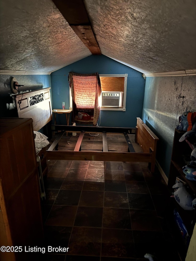 bedroom featuring lofted ceiling and cooling unit