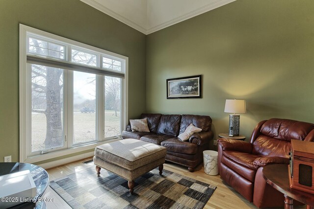 living area with light wood-style flooring and visible vents