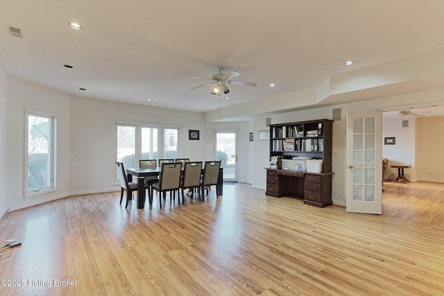 dining room with french doors, light wood finished floors, recessed lighting, visible vents, and a ceiling fan