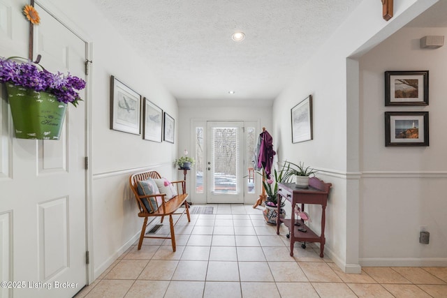 950 Lakeview Dr, Bloomfield, KY 40008 - entryway featuring light tile patterned flooring, recessed lighting, baseboards, and a textured ceiling