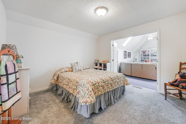 950 Lakeview Dr, Bloomfield, KY 40008 - carpeted bedroom featuring lofted ceiling, baseboards, and a textured ceiling