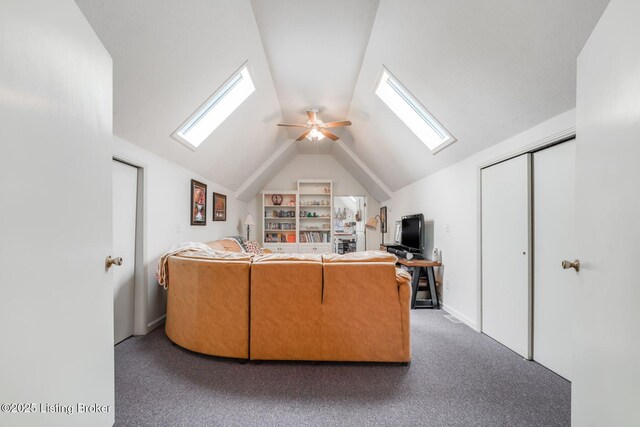 950 Lakeview Dr, Bloomfield, KY 40008 - carpeted living area featuring ceiling fan, vaulted ceiling with skylight, and built in shelves