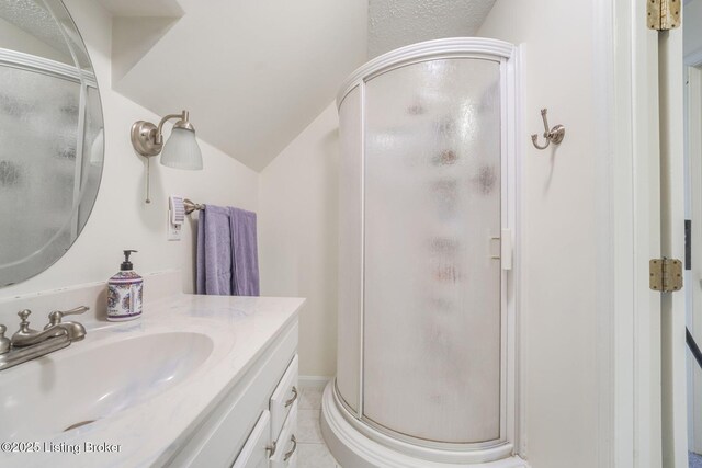 950 Lakeview Dr, Bloomfield, KY 40008 - bathroom featuring tile patterned floors, vanity, a shower stall, and vaulted ceiling