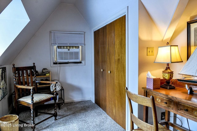 sitting room featuring cooling unit, carpet flooring, and vaulted ceiling