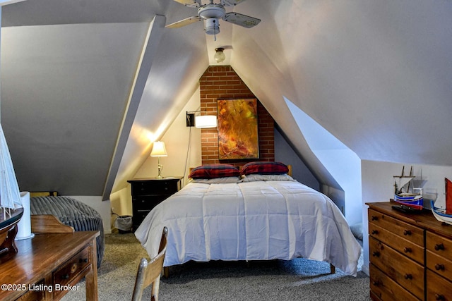 bedroom featuring lofted ceiling, carpet, and a ceiling fan