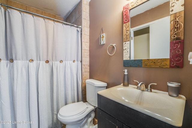 full bathroom with curtained shower, vanity, and toilet