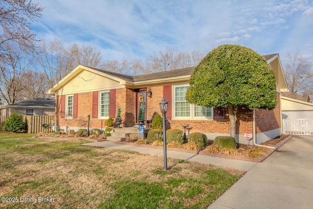 ranch-style home featuring a garage, brick siding, a front lawn, and fence