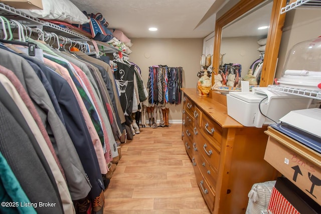 spacious closet with light wood-type flooring