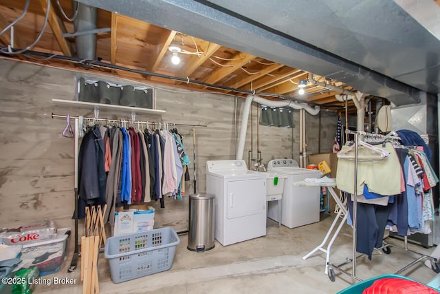 unfinished basement with separate washer and dryer