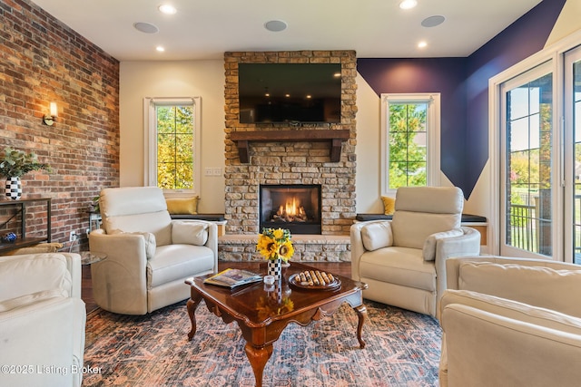 interior space with a fireplace and recessed lighting