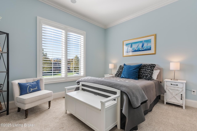 bedroom featuring light carpet, baseboards, and crown molding