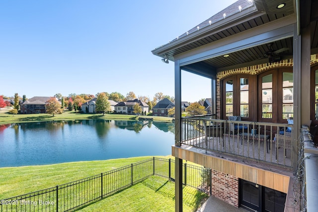 water view featuring a fenced backyard and a residential view