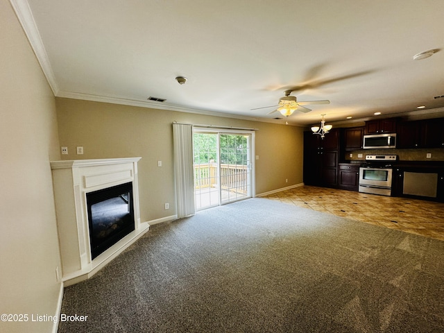 743 N Hite Ave Unit 4, Louisville, KY 40206 - unfurnished living room with crown molding, baseboards, light carpet, a glass covered fireplace, and a chandelier
