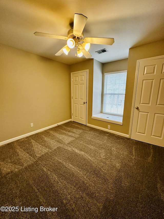 743 N Hite Ave Unit 4, Louisville, KY 40206 - unfurnished room with dark colored carpet, baseboards, and ceiling fan