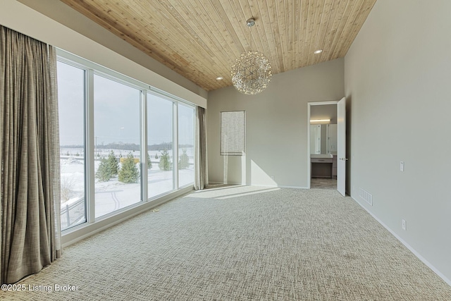 carpeted empty room featuring recessed lighting, visible vents, wood ceiling, vaulted ceiling, and an inviting chandelier