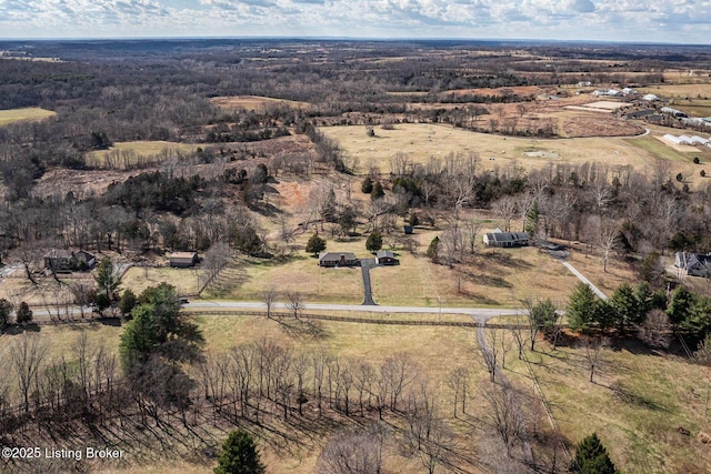 birds eye view of property with a rural view