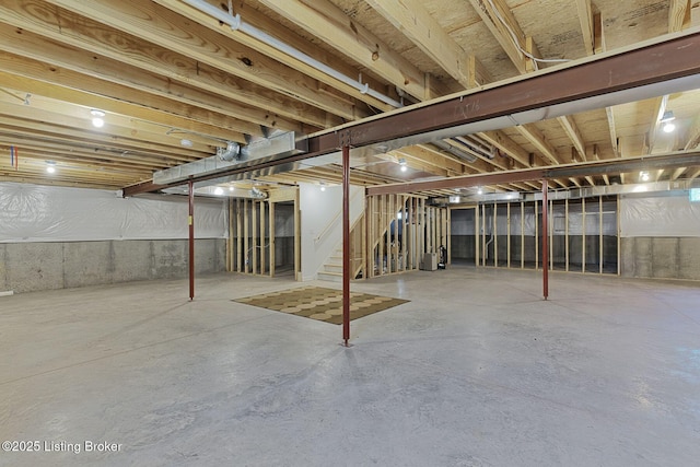 unfinished basement with stairs