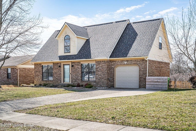 view of front of home featuring brick siding, driveway, a front lawn, and roof with shingles