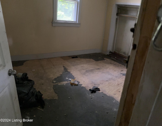 unfurnished bedroom featuring baseboards