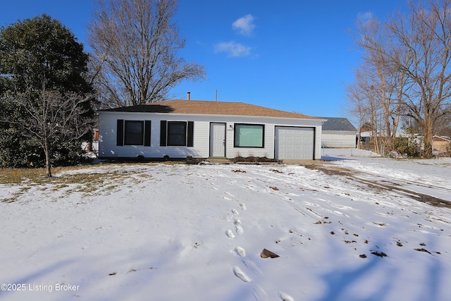 ranch-style house featuring an attached garage