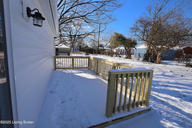 view of snow covered deck