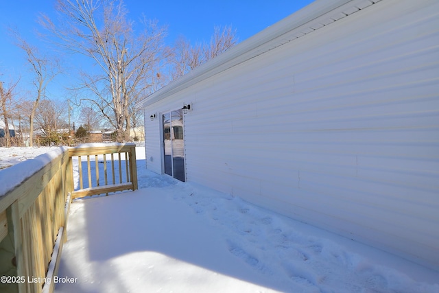 view of snow covered deck