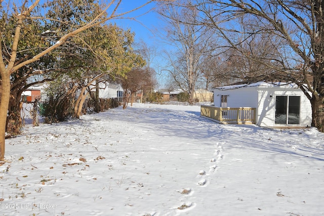 view of yard covered in snow