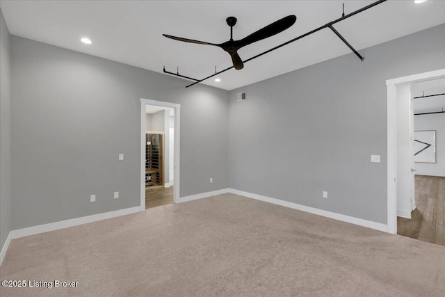 interior space with ceiling fan, recessed lighting, visible vents, and baseboards