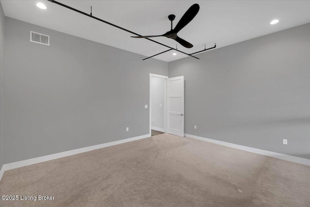 spare room with visible vents, baseboards, a ceiling fan, light colored carpet, and recessed lighting