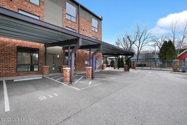 covered parking lot with fence